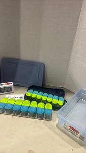 lot 1263 image: Pill organizers, with Med center alarm clock for reminder with Rubbermaid 5 l container
