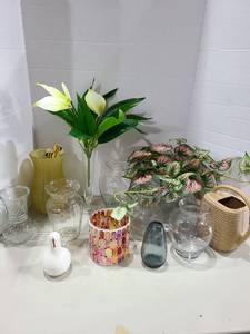 lot 1280 image: Vases with artificial flowers and plastic watering can