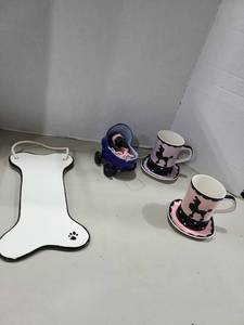 lot 1290 image: Dog-Themed Novelty Mug Set with Pram and Bone Dish 5-Piece Lot