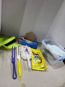 lot 1304 image: Cleaning Supplies Lot Brushes, Mitts, Pledge Wipes, Cloths, Storage Containers