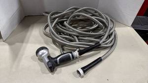 lot 1313 image: Metal garden hose