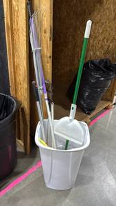 lot 1404 image: Trash can with broom, rakes and dusters