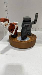 lot 2021 image: Santa, poodle and fireplace wood decor