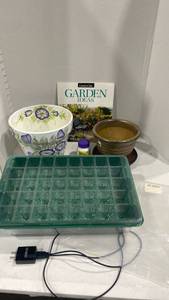 lot 2079 image: Garden supplies with electric seed starter and pretty painted pot