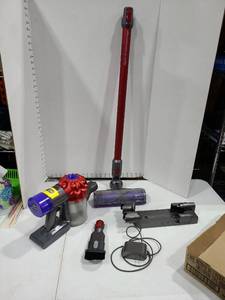 lot 2106 image: Dyson v8 Motorhead cordless stick vacuum works