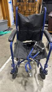 lot 4052 image: Carex Lightweight Transport Wheelchair Blue Frame Black Seat 18 inch width of seat