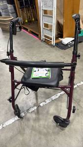 lot 4054 image: Four-Wheel Rollator Walker with Seat and Nova WalkSafe Flashlight