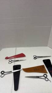 lot 112 image: Hair Scissors EHASO and Cheetah Professional Styling Shears