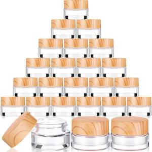 lot 9701 image: Geiserailie 24 Pcs 5 Gram Glass Cosmetic Jars with Lids Small Empty Sample Jars with Inner Liners Leak Proof Lids Makeup Sample Containers for Cream, Lotions, Powders and Ointments DIY (Clear)