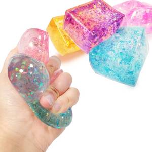 lot 9861 image: 4pcs Glitter Ice Cubes - Colorful Sensory Fidget Toys for Adults & Kids, Fun Squeeze Ball for Stress Relief, Holiday and Birthday Gifts, Perfect Party Toy Gift, Easter Basket Gift
