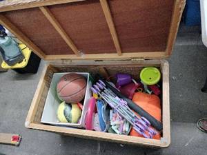 lot 61886 image: Wicker Storage Chest With Outdoor Play Items