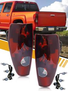lot 5016 image: CLERYYE Tail Light Assembly in Pair Compatible with Chevrolet Colorado 2004-2012 and GMC Canyon 2004-2012, OE-Style Halogen Brake Rear Lamp Replacement, wBulbs and Harness, Left and Right Side, Pair - Retail $56