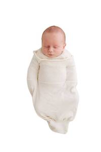 lot 13099 image: Swaddelini Organic Cotton Sleep Sack, Swaddle for Newborns, 0-3 Month Baby Sleep Sack, 12-18 pounds, Made in USA - Retail $70