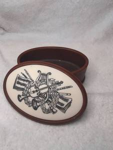 lot 1503 image: Oval Decorative Box with Musical Instruments Inlay Design