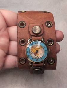 lot 3011 image: Unique Barbie Watch with Brown Leather Cuff Band