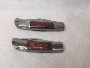 lot 4004 image: National Rifle Association Folding Pocket Knife Pair Stainless Steel