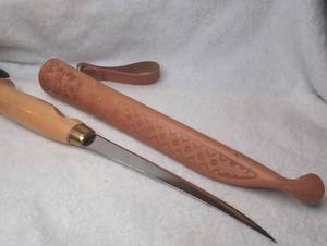 lot 4010 image: Puukko Knife with Carved Leather Sheath and Brass Band