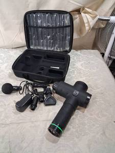 lot 16 image: Percussion Massage Gun with Carrying Case and Multiple Attachments