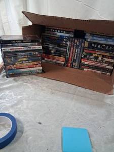 lot 21 image: Large Lot of Assorted DVDs - 50 Movies and TV Shows