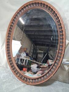 lot 50 image: Carved Oval Rubbed Bronze Wall Mirror