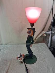 lot 88 image: Hand-Painted Clown Figure Metal Table Lamp with Red Glass Shade