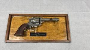 lot 42 image: Framed mounted 1886 .45 cal peace maker replica 7.5 x 15 in