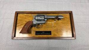 lot 43 image: Framed mounted 1886 peace maker replica 7.5 x 15 in