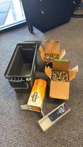lot 124 image: Plastic ammo can with .22 ammo (closed boxes are full boxes)