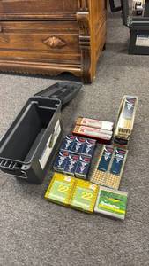 lot 127 image: Plastic ammo can with .22 ammo (closed boxes are full boxes)