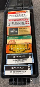 Plastic ammo can with ammo (closed boxes are full boxes)