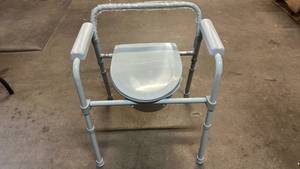 lot 2028 image: Drive Medical Folding Commode Chair