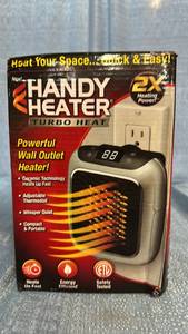 lot 2096 image: Handy Heater Turbo Heat Wall Outlet Space Heater