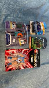 lot 2106 image: Mixed Collectibles Lot ThunderCats Lion-O, Space Jam LeBron James, Hot Wheels & TMNT Magic Card Pack