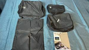 lot 2137 image: Open Story 4-Piece Packing Cube Set with Shoe Bag