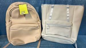 lot 8019 image: Set of 2 All In Motion Backpacks - One in Beige Color with Multiple Compartments and Side Pockets and One Tote Style White in Color with Multiple Compartments and Carrying Handles