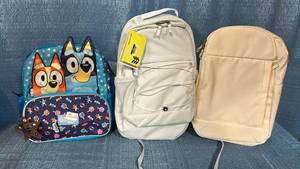 lot 8020 image: Backpack Bundle - Bluey Kids Backpack & 2 All in Motion Backpacks - All with Multiple Compartments for Books, PensPencils and Water Bottles.
