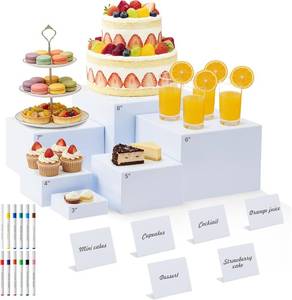 lot 22925 image: Nestable Buffet Risers - 6 Pcs White Acrylic Food Risers with Signs & Markers   Sturdy Dessert Table Display Stands for Parties, Catering, Jewelry & Collectibles (Easy-Store Stackable Cubes 8, 7, 6, 5, 4, 3)