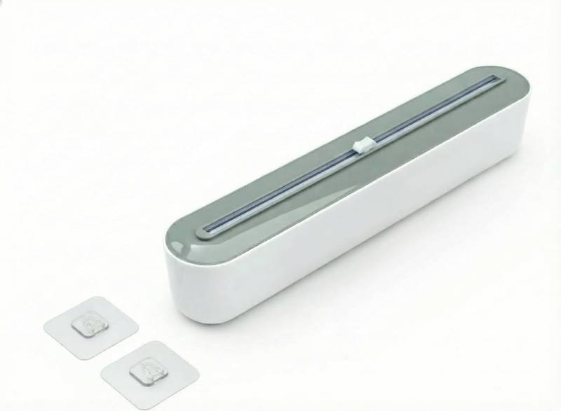lot 17557 image: Plastic Wrap Dispenser with Cutter, Gray White ABS Material, Wall Mount or Countertop, 393mm x 63mm x 85mm, Universal Size Compatible with Plastic Wrap, Parchment Paper, Aluminum Foil