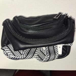lot 23119 image: MINI CARRY BAG BLACK WITH WHITE STRIPS