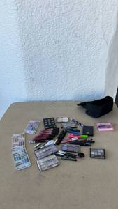 lot 29 image: Large Mixed Drugstore Makeup Lot with Cosmetic Bag some new some used