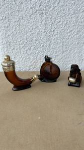 lot 32 image: Amber Glass Novelty Decanter Set of 3
