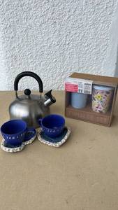 lot 33 image: Stainless Steel Whistling Tea Kettle with Blue Tea Mugs and Coasters Set and gift cup set