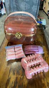 lot 74 image: Pink Vanity Organizer Set with Hair Rollers, Massager and Comb