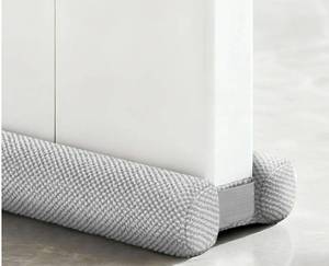 lot 46699 image: Premium Plush Under Door Draft Stopper Noise Blocker �� Blocks Drafts, Dust, Noise & Light, 32-36 Inch Adjustable Door Sweep Gap Filler Bottom Door with Secure Hook & Loop Tabs. - Retail $16