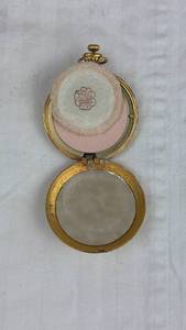 lot 54 image: Gold-Tone Pocket Watch blush with Engraved Case and Interior Locket