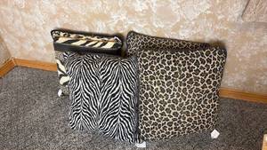 lot 66 image: Animal Print Throw Pillows 4-Piece Set Zebra Leopard Striped