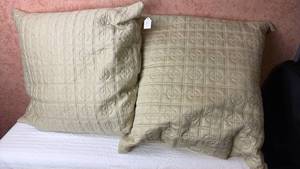 lot 97 image: Pair of Quilted Throw Pillows Tan 23x23