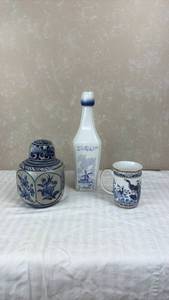 lot 104 image: Blue and White Ceramic Collection - Ginger Jar, Delft Bottle, and Peacock Mug