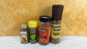 lot 145 image: Assorted Spice Collection - 4 Bottles