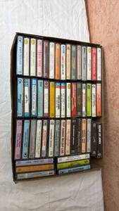 lot 230 image: Lot of 60 Assorted Cassette Tapes in Storage Case